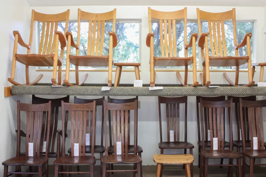 rocking chairs and dining chairs in drying rack
