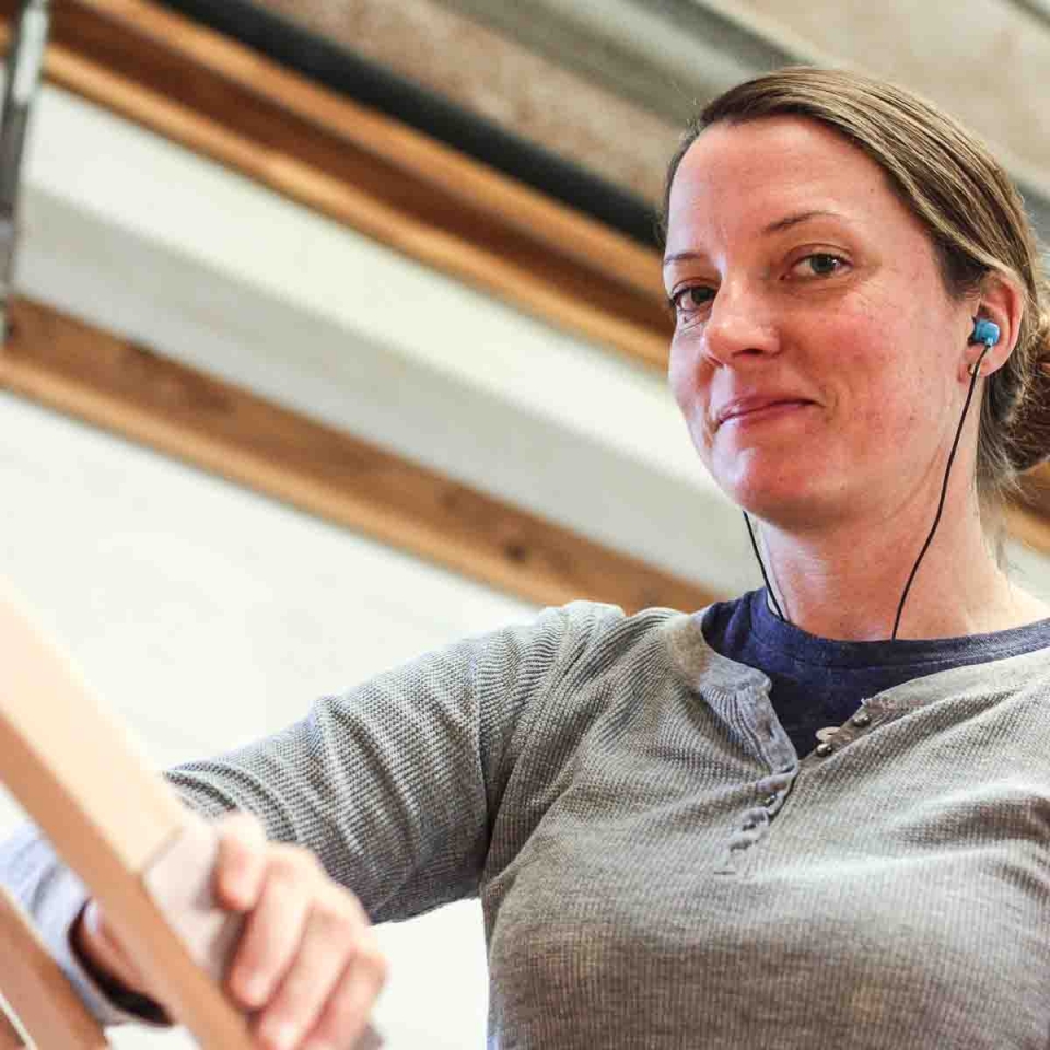 Autumn sanding a rocking chair back leg