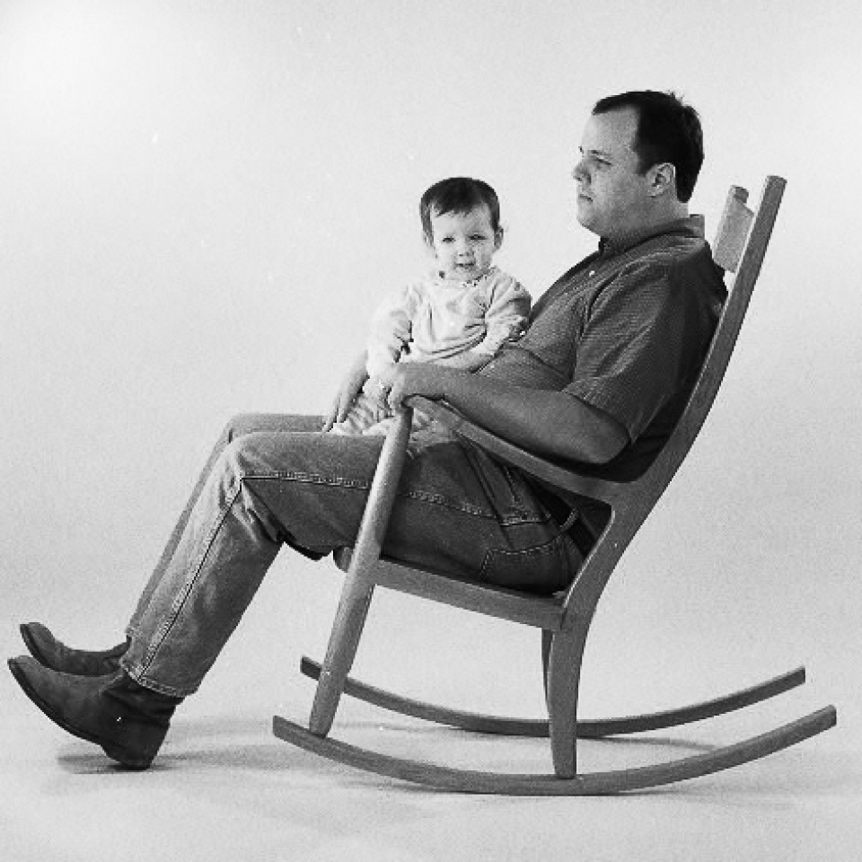 Mark and Julia in rocking chair, B&W