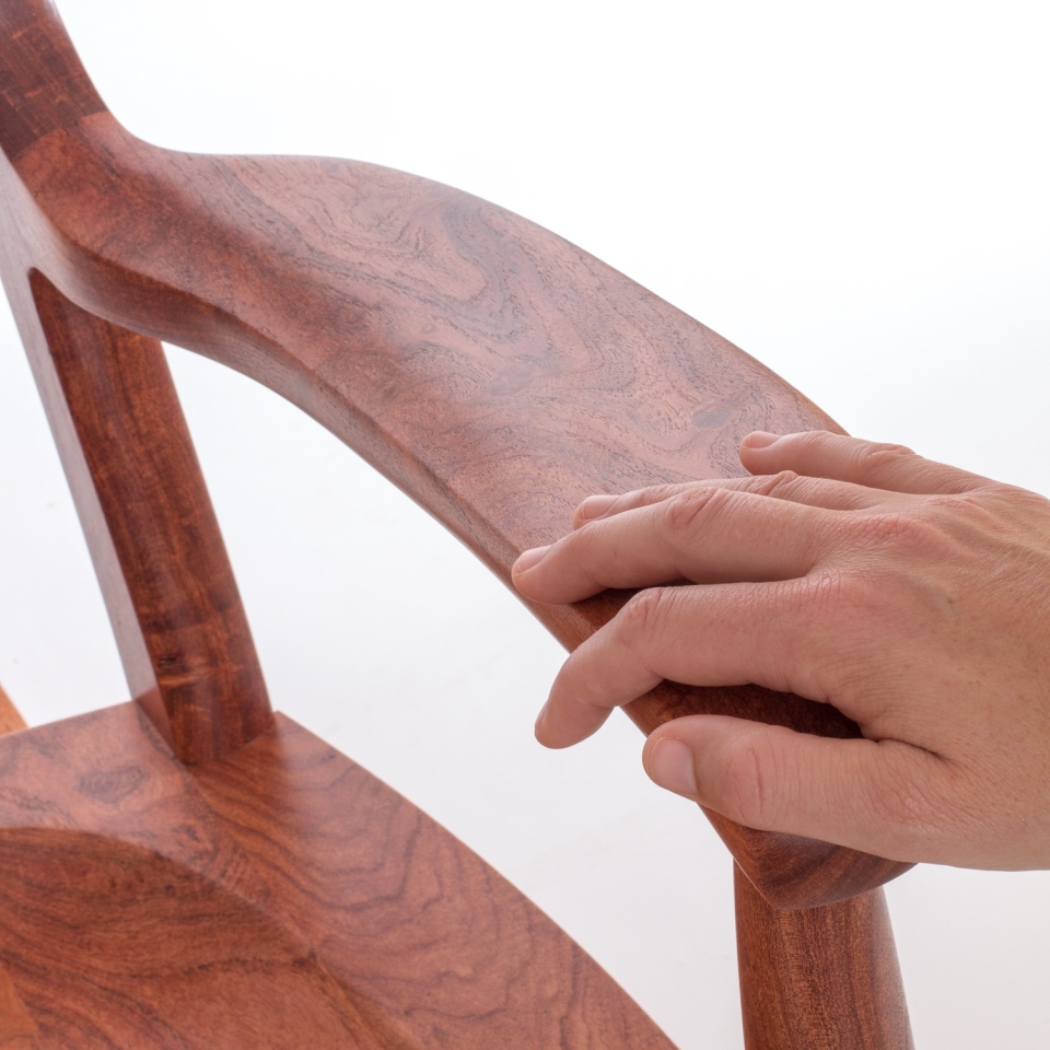 hand on rocking chair arm