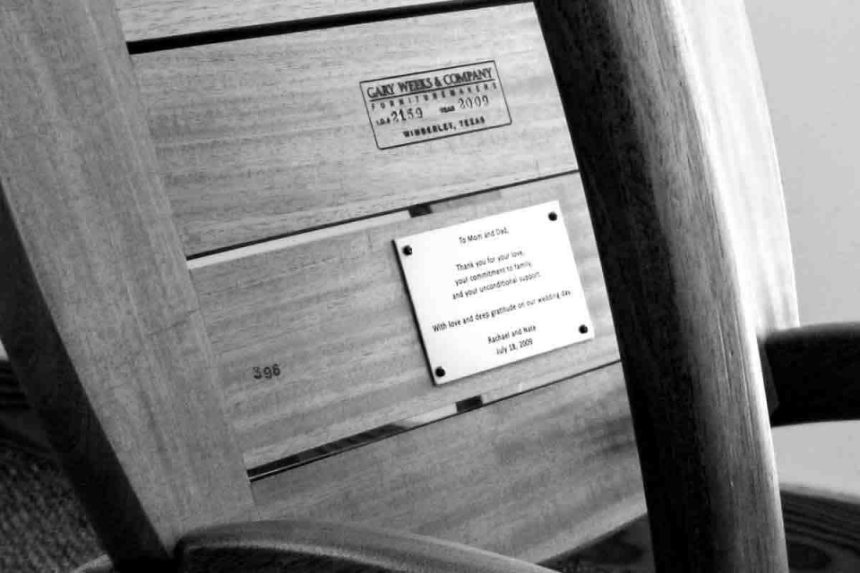 bronze plaque on rocking chair bottom