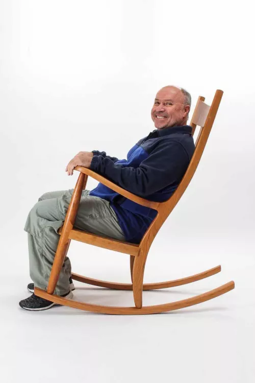 patron in rocking chair for retirement, 18-111-Edit