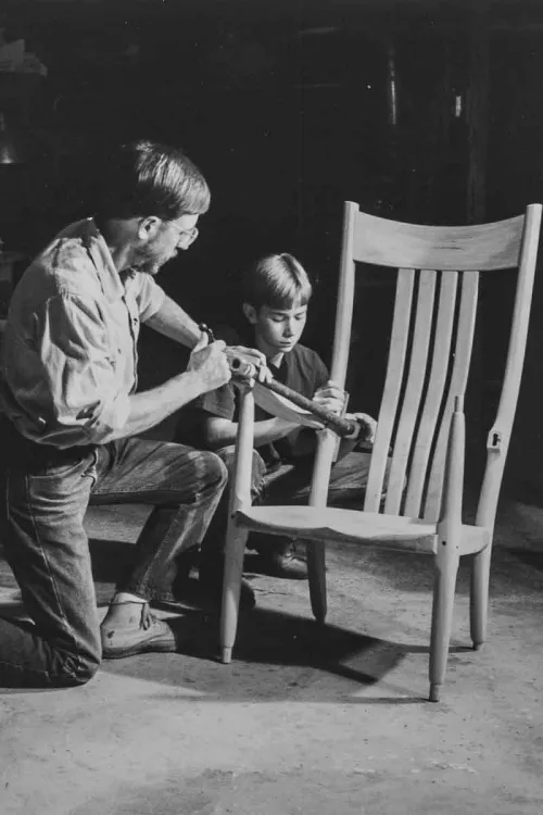 Gary and Zach assembling a rocking chair