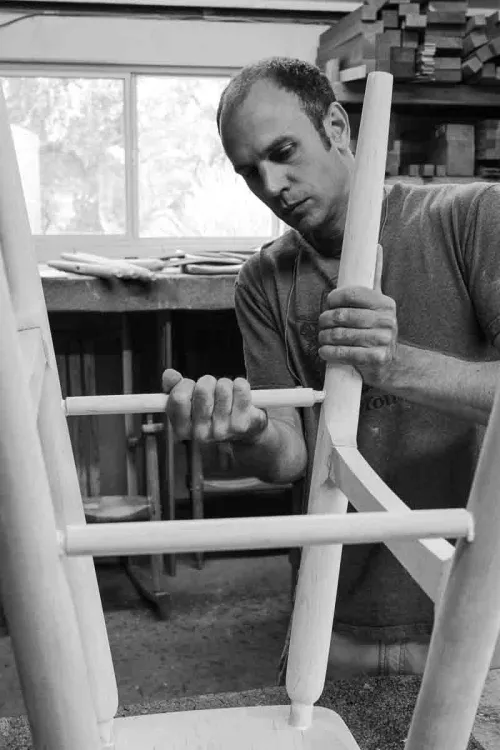 Austin gluing a barstool spindle