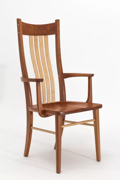 arm chair, front quarter view, in studio