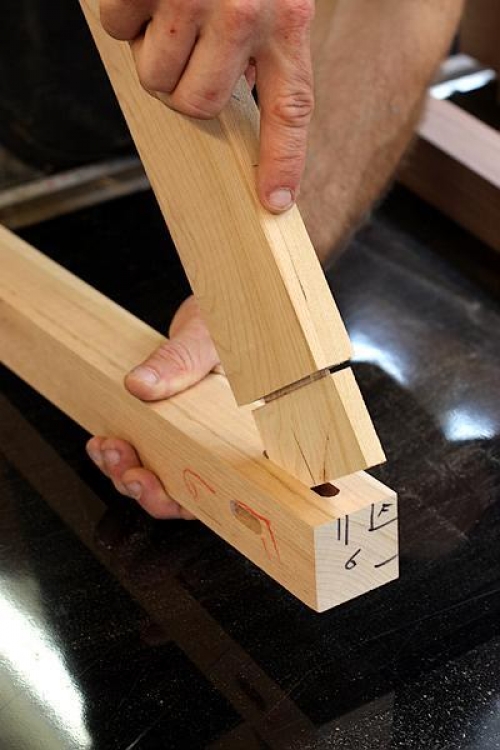 fitting a tenon to the mortise