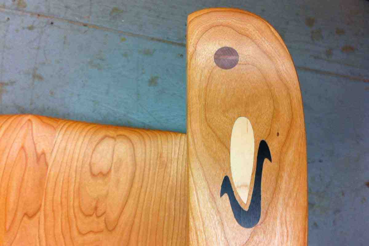 Wyffels logo inlay in chair arm