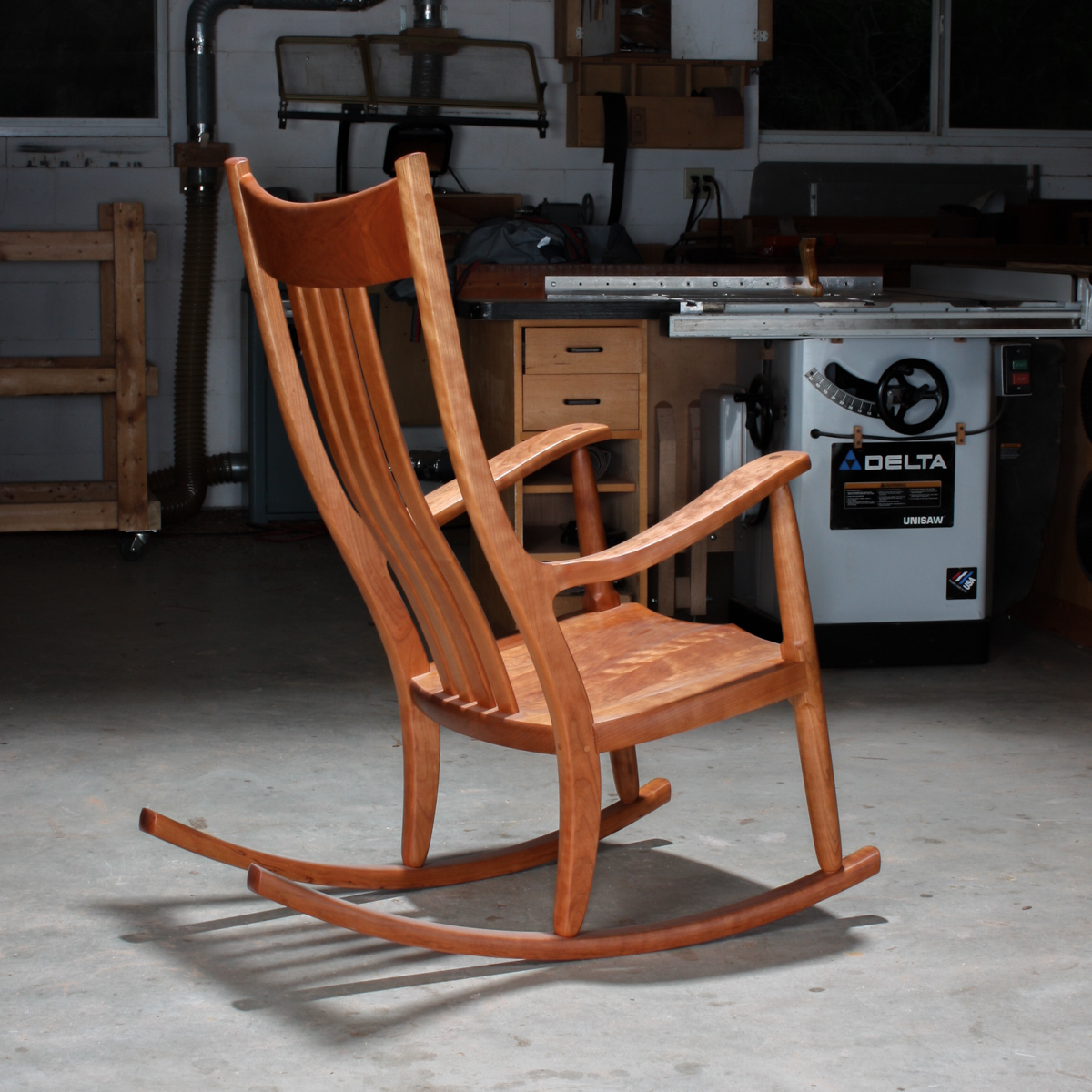 cherry rocker in shop with overhead light