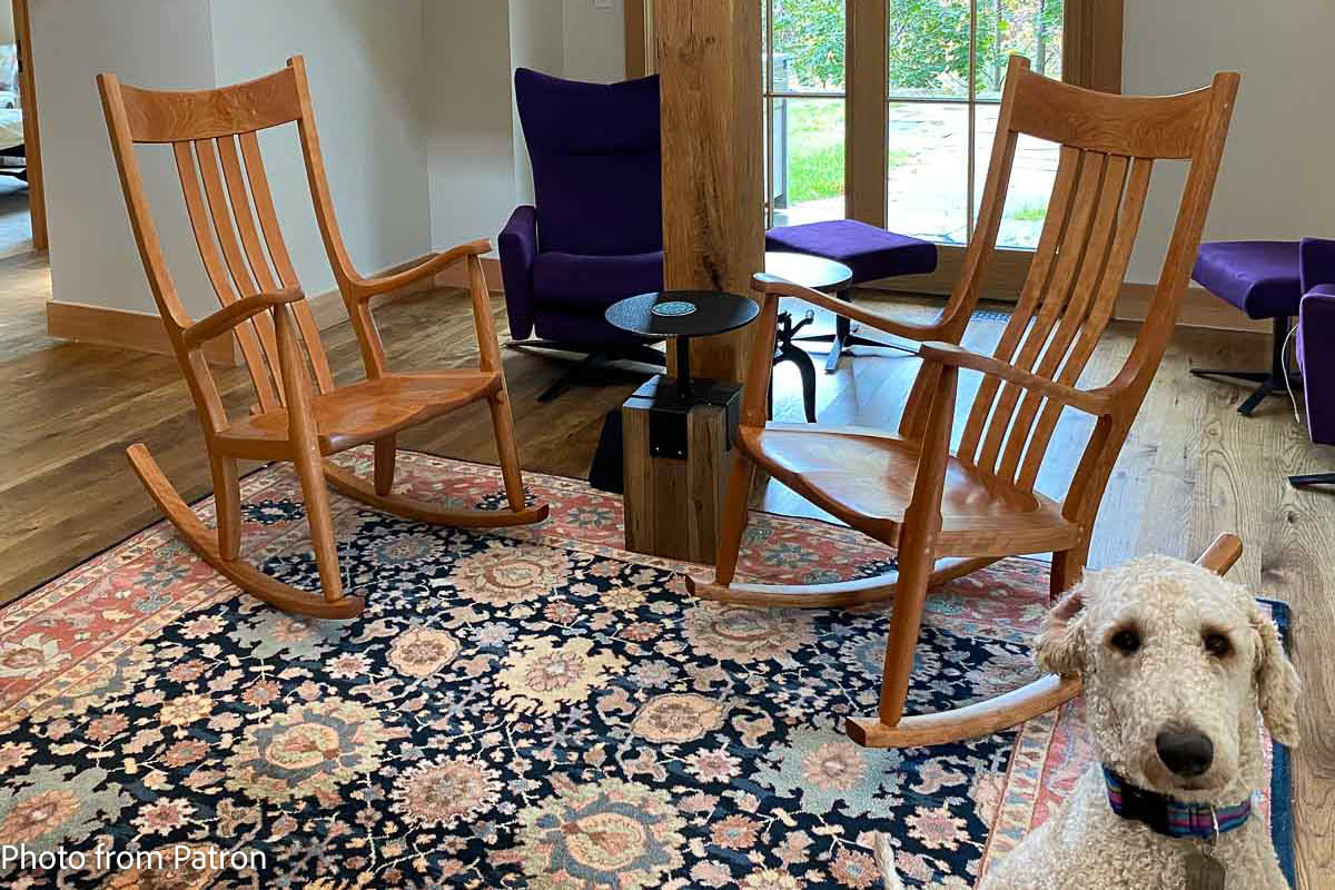 Two Cherry Rockers with Big White Dog