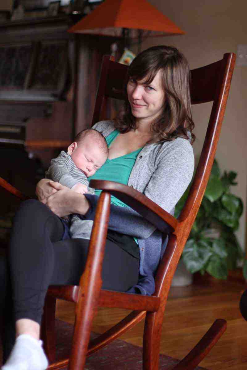 Aubrey and baby Townes in rocking chair