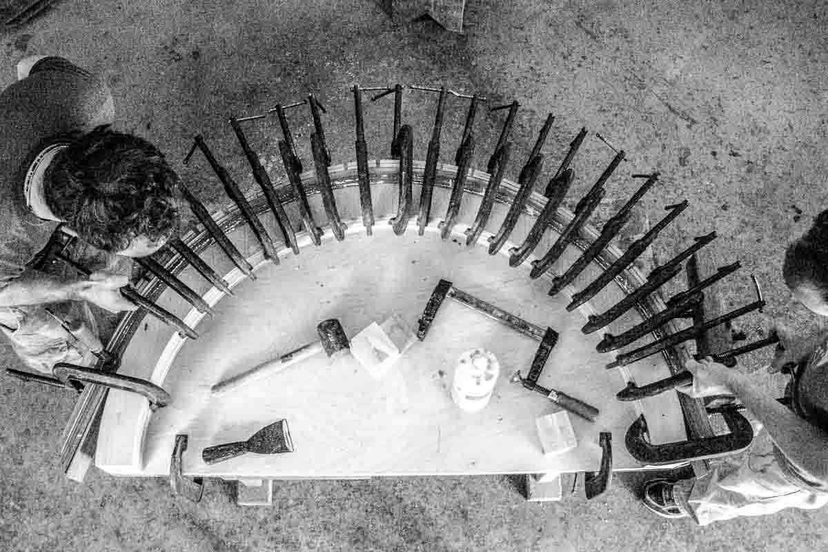 Laminating a curved apron