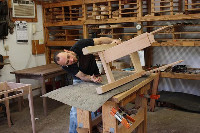 Aaron assembling a standup desk