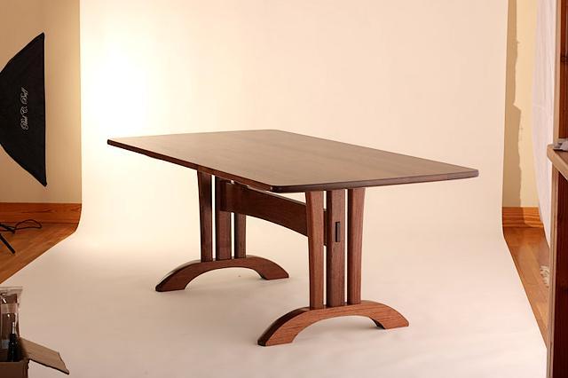 trestle table photographed on a backdrop